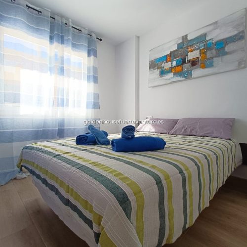 Dormitorio principal con cama doble en AP 0046 OCEAN DREAM